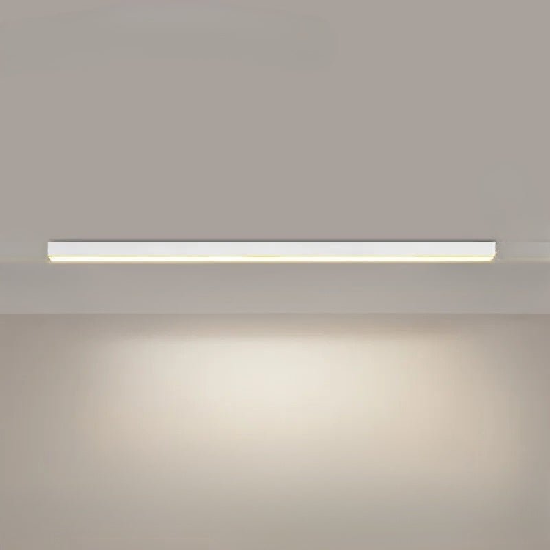 Linear LED ceiling light illuminating a home office