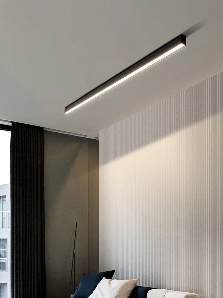 Linear LED ceiling light in white finish shown from below