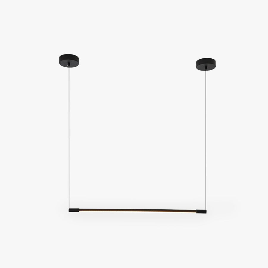 Minimalist modern LED pendant light hanging in a living room