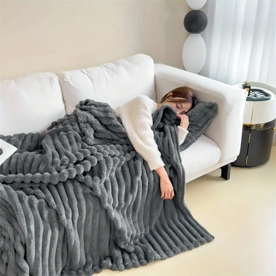 Close-up of the striped pattern on a fluffy blanket