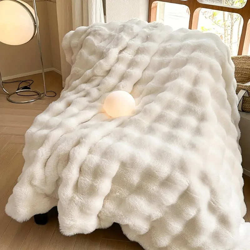 Detail shot showing the blanket's fluffy fibers