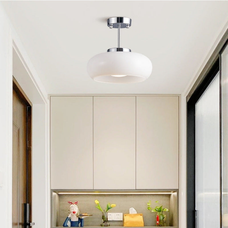 Ceiling light fixture mounted flush against the ceiling