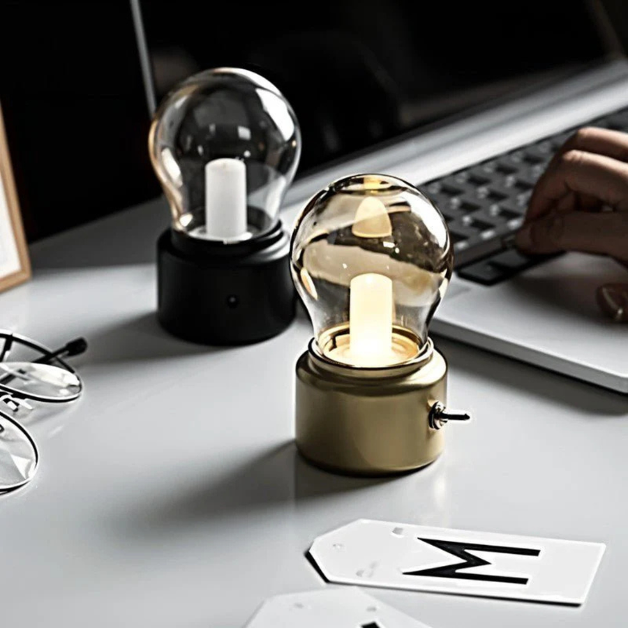 Hand holding the portable retro bulb lamp