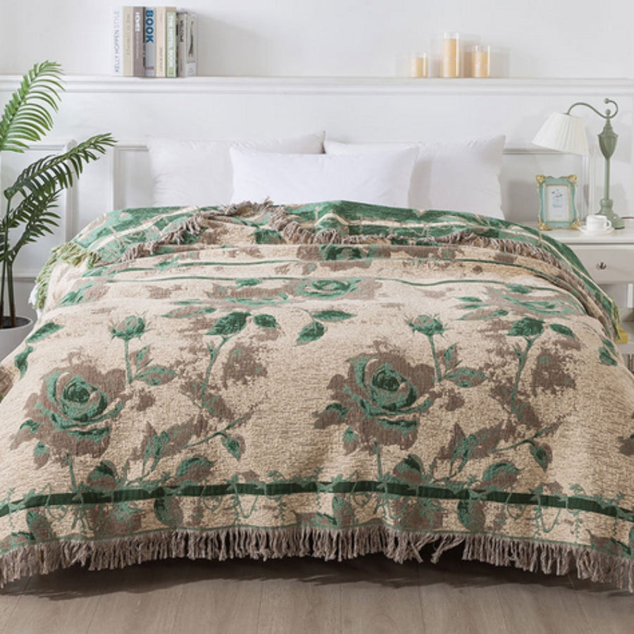 Textured floral pattern throw blanket folded neatly