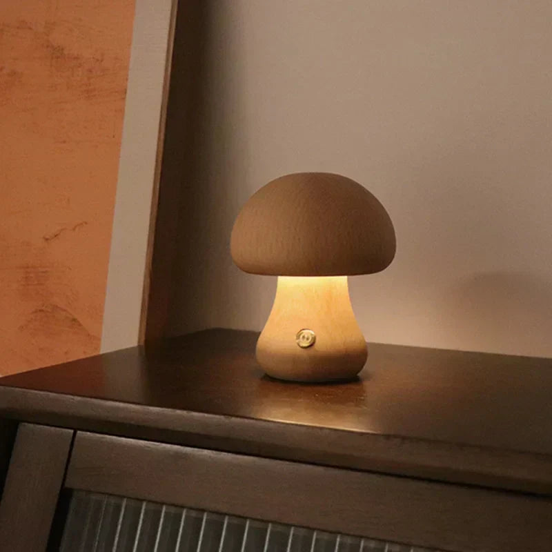 Touch table lamp illuminated in a dark bedroom setting