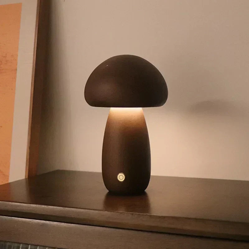 Touch table lamp on a desk with warm ambient light