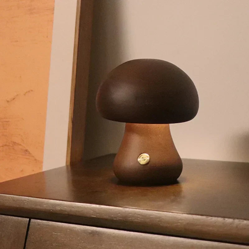 Table lamp shown next to books and a plant