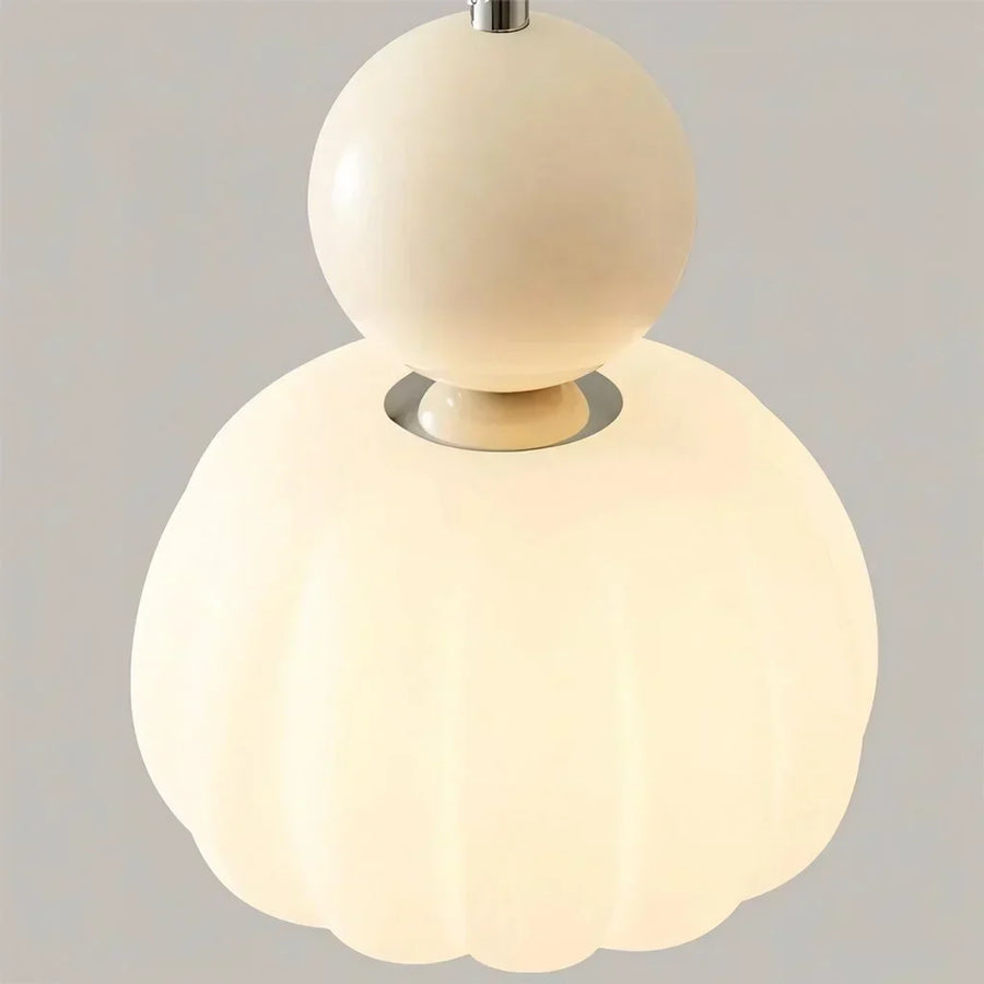 Pendant light illuminated in a kitchen dining area