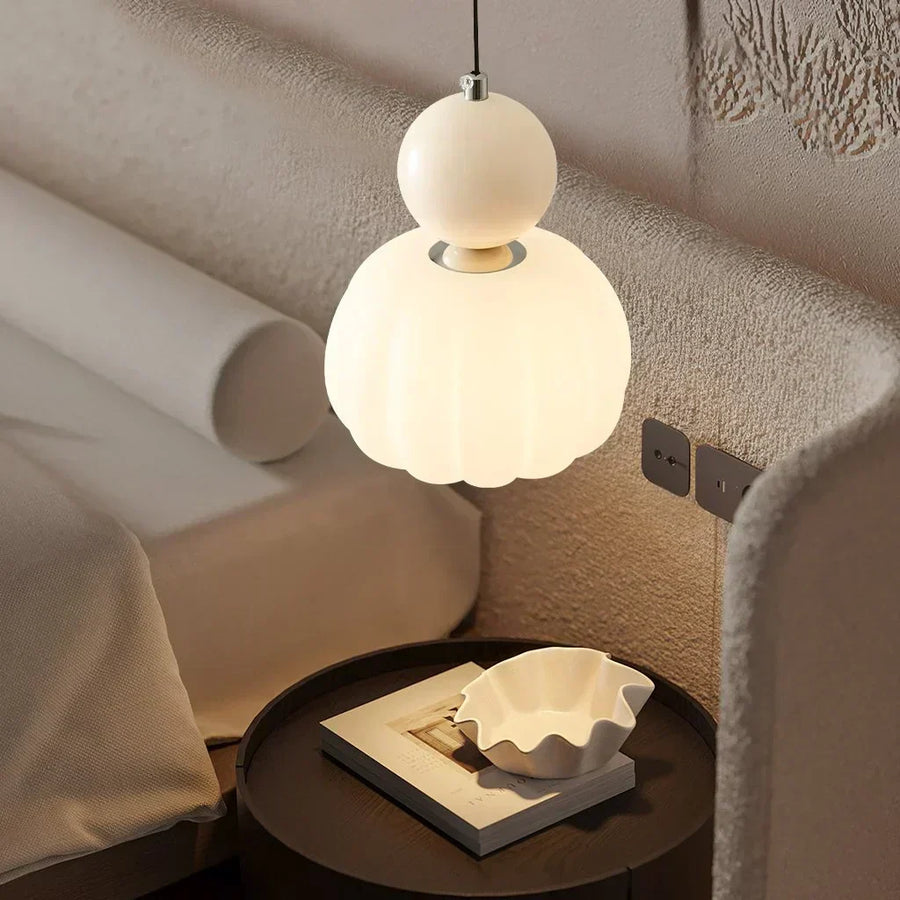 Close-up of the pendant light's frame and glass shade