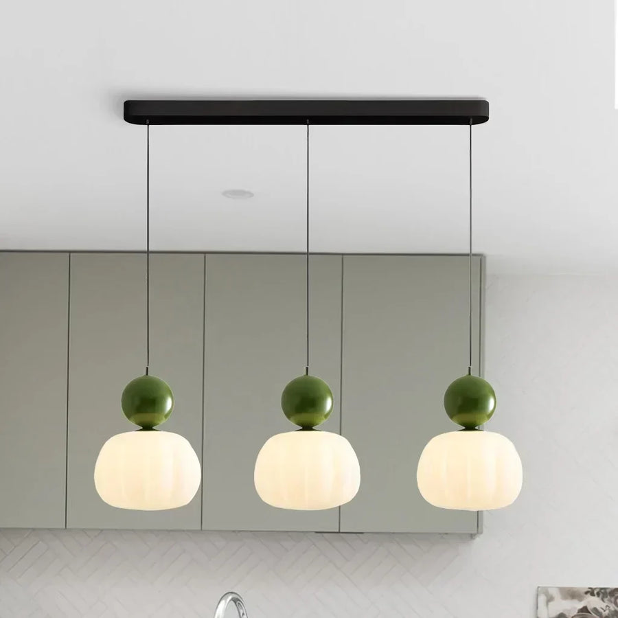 Three-head pendant light arrangement viewed from the front