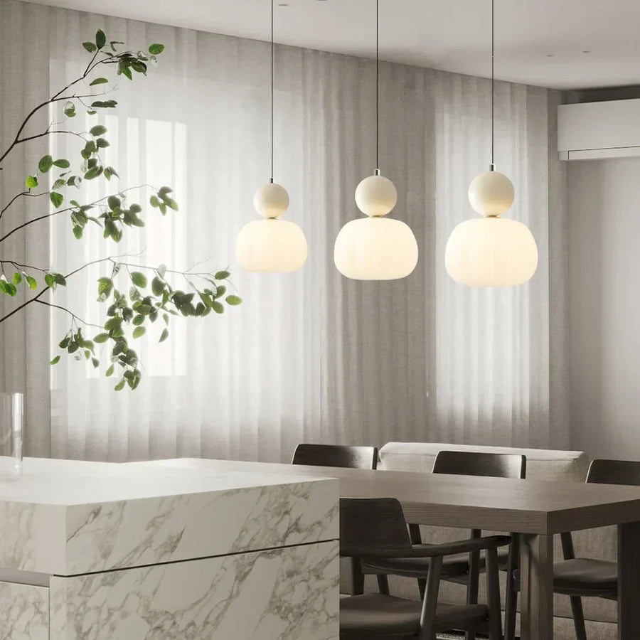 Pendant light with adjustable cord length shown