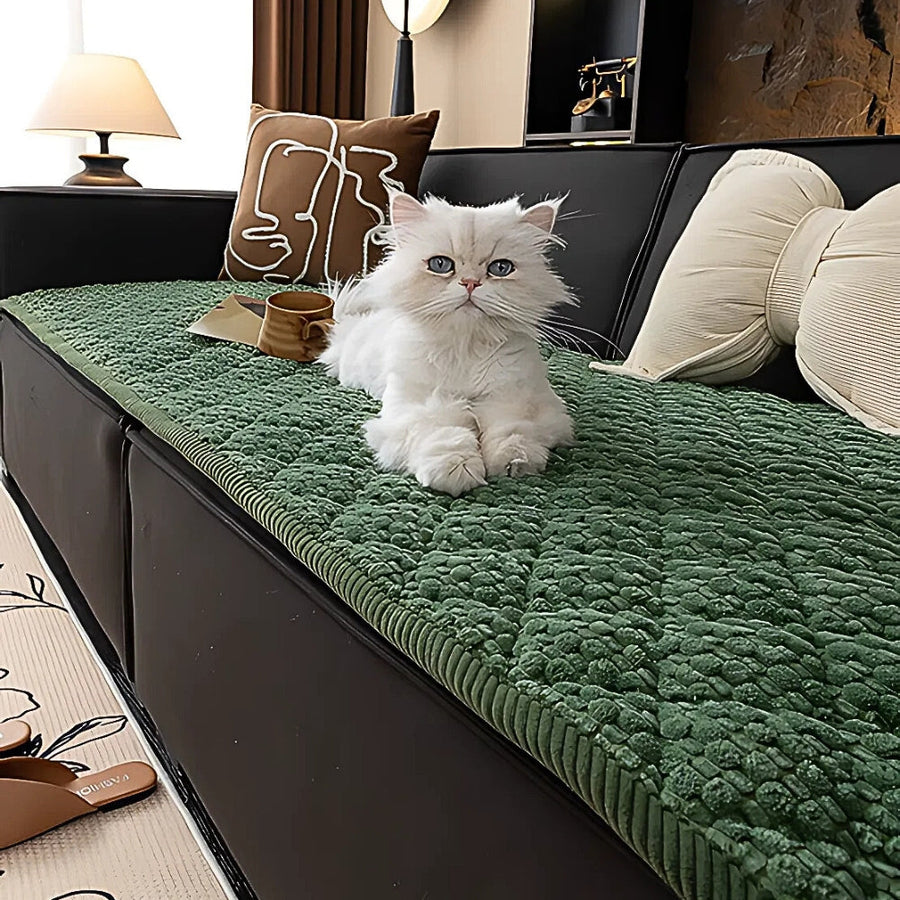 Knit non-slip sofa cover shown from a side angle