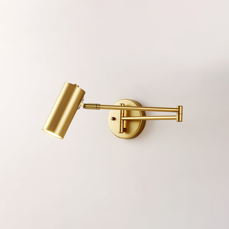 Minimalist LED wall sconce mounted on a white wall
