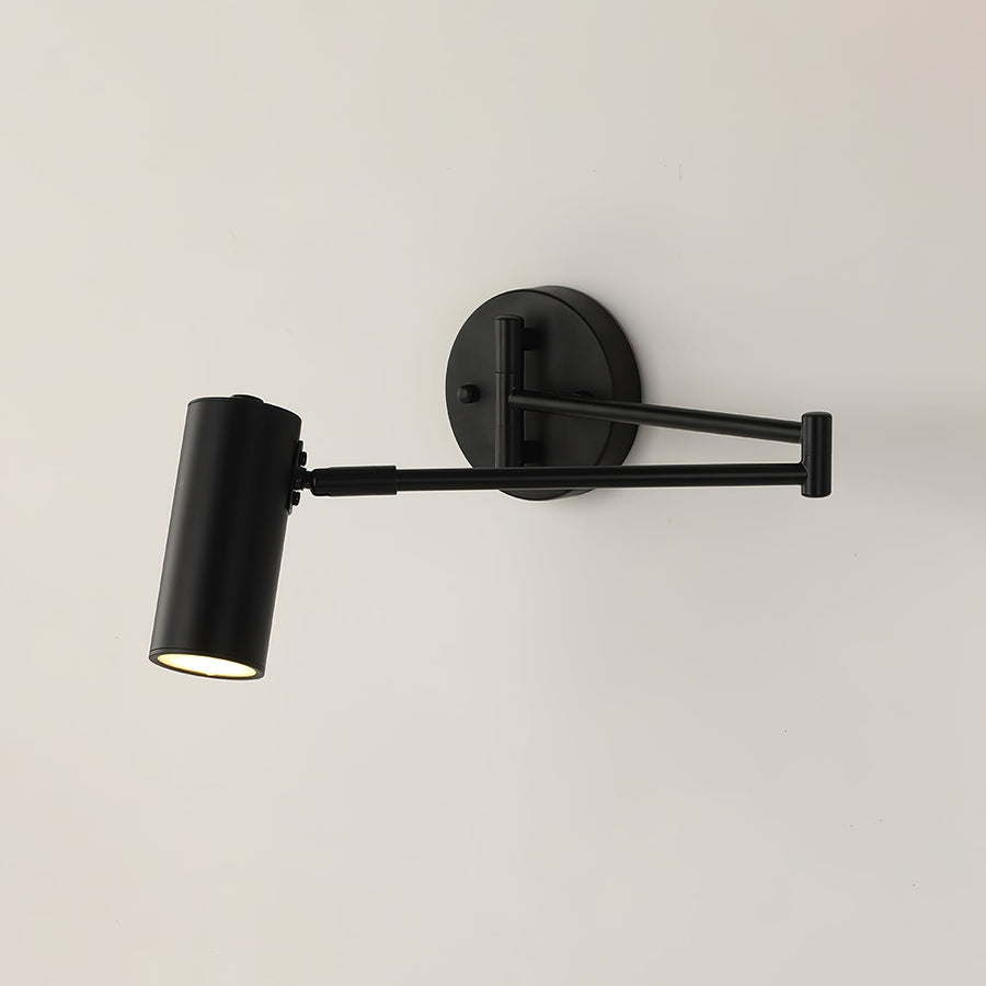 Wall sconce shown in a cozy living room setting