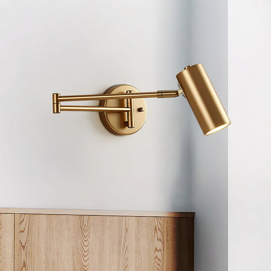 Wall sconce with arm folded against the wall