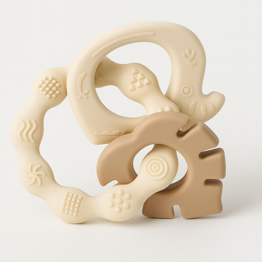 Neutral beige and brown silicone teething rings with textured surfaces in an interlocked design.