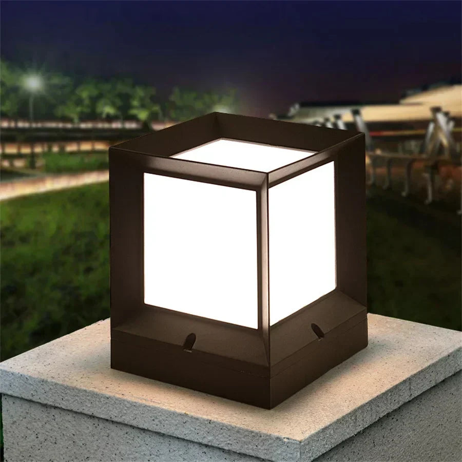 Modern outdoor pillar gate lamp mounted on a stone pillar