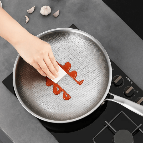Overhead view of the frying pan showing its round shape.