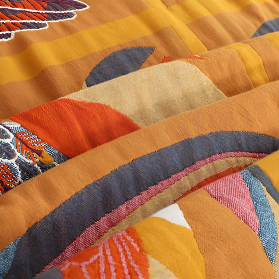 Folded tropical toucan print throw blanket showing texture