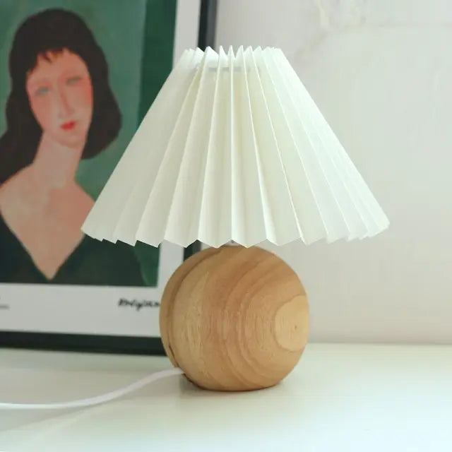 Table lamp shown in a living room decor scene
