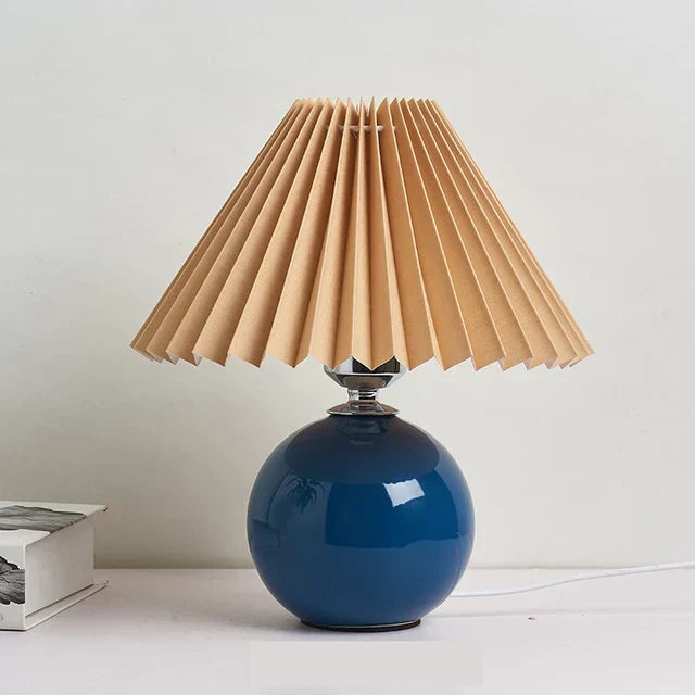 Table lamp with ceramic base and pleated shade