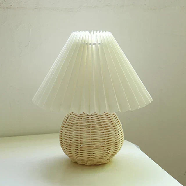 Table lamp shown in black and brown color option