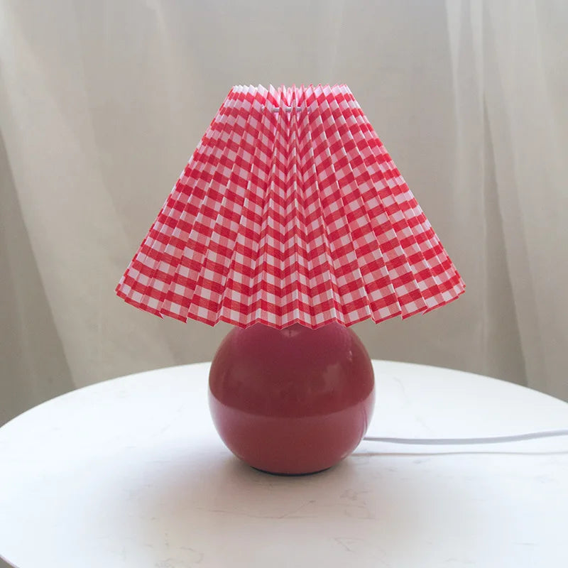 Table lamp shown on a desk setup