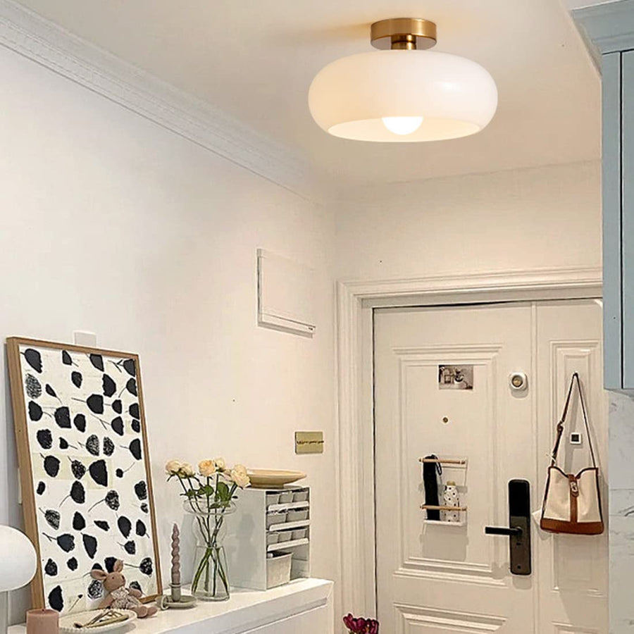 Side view of the round ceiling light fixture