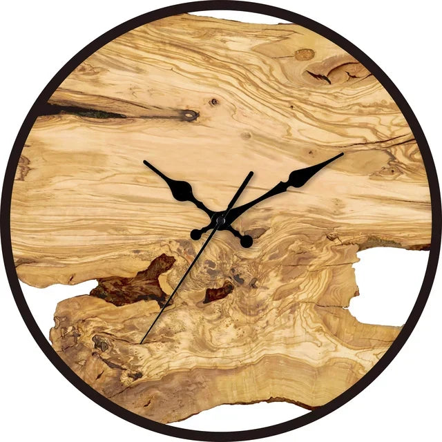 Transparent wall clock with a minimalist round design.