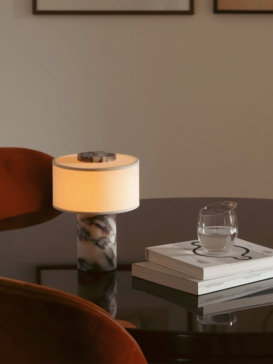 Auríe Portable Lamp shown in Calacatta Viola marble and linen.