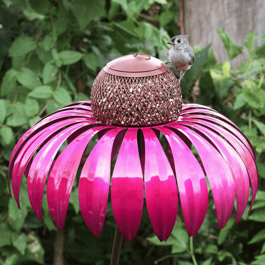 Bird feeder in pink flower shape on display