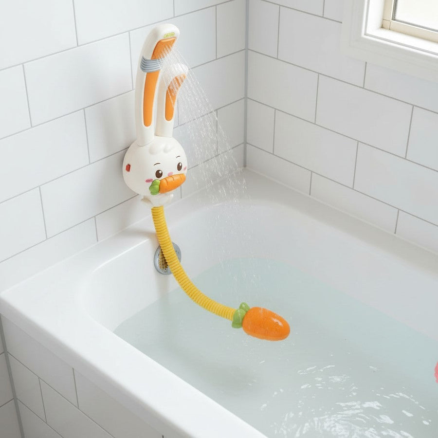 Bunny-shaped bath shower attached to the tub wall with a carrot floating in the water