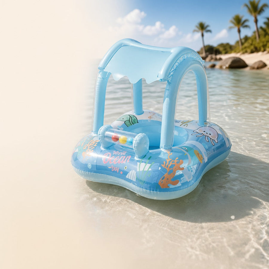 Blue inflatable baby swim float with sun canopy and sea design on the beach