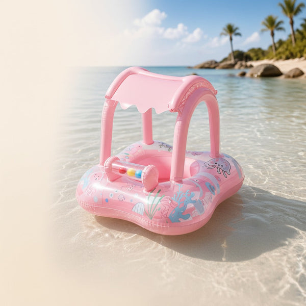 Pink inflatable baby swim float with sun canopy and sea design on the beach