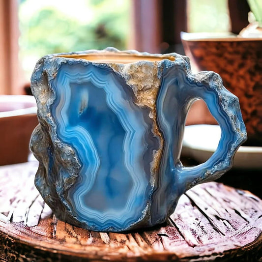 Textured coffee mug with insulated walls displayed on a plain background