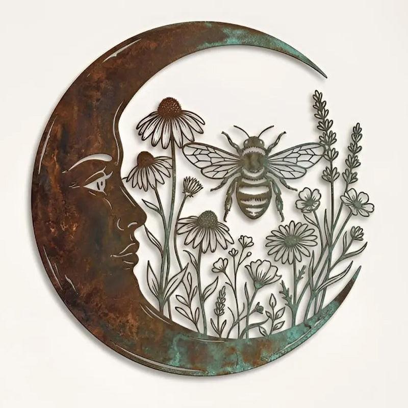 Close-up of bee crescent moon wall art with rusty finish