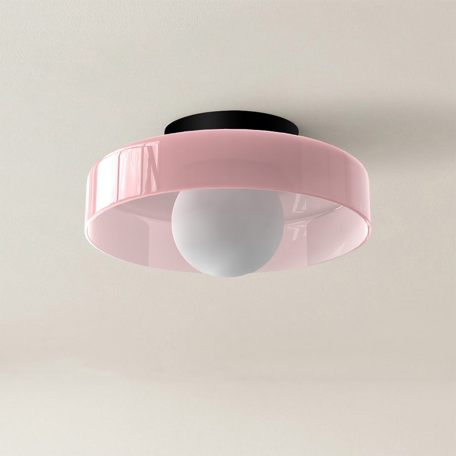 Minimalist LED flush mount ceiling light mounted on a white ceiling