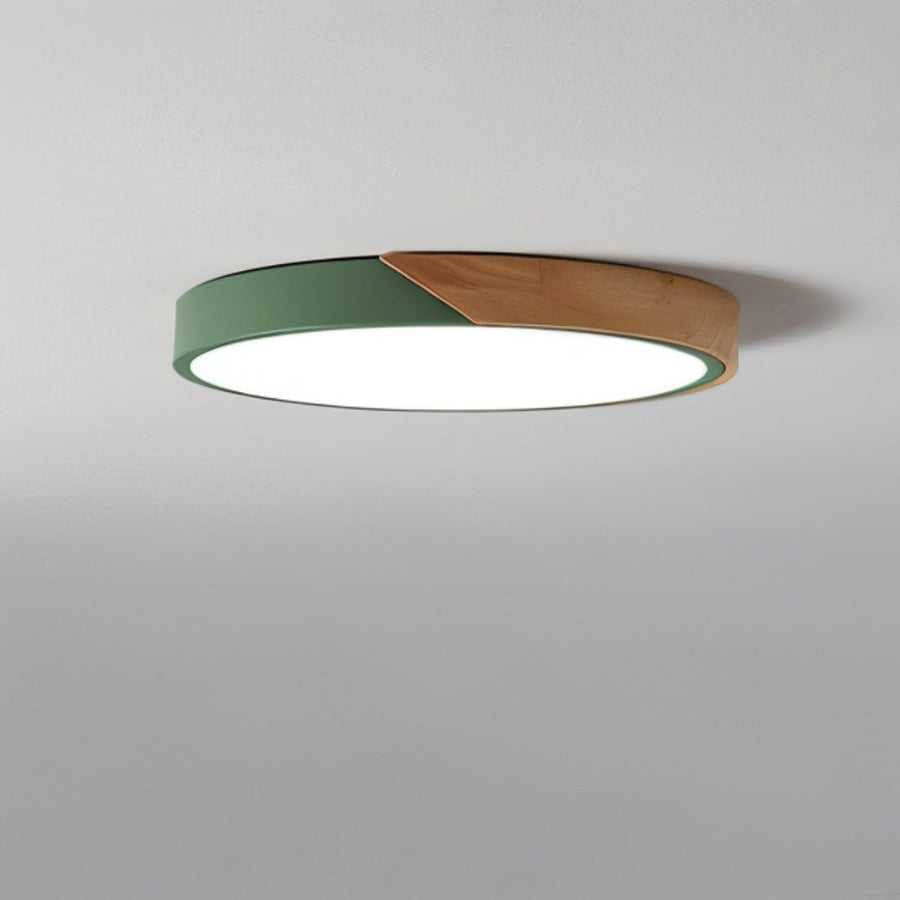 Yellow round LED ceiling light mounted on ceiling