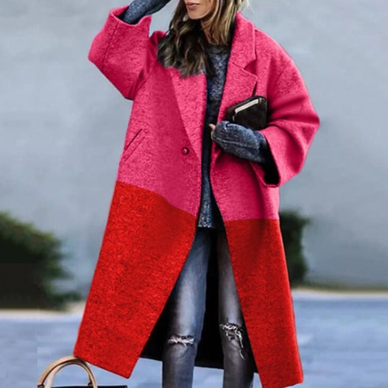 Woman wearing a long trench coat outdoors