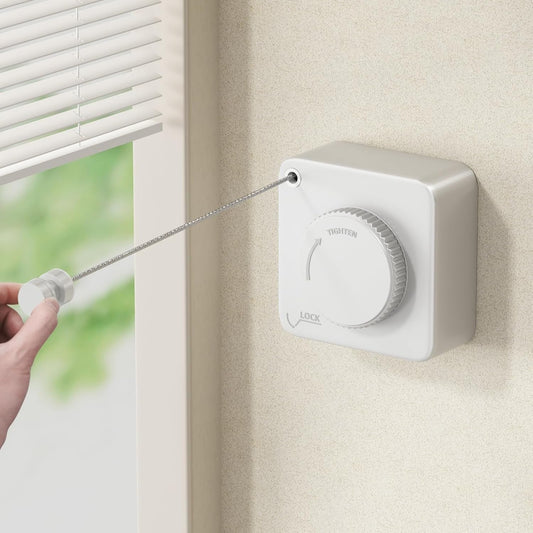 White retractable clothesline with a hand pulling out the line