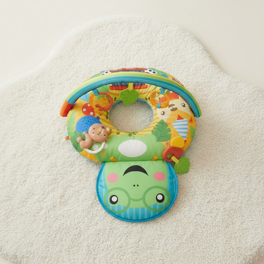 Overhead view of the tummy time pillow set with play arch