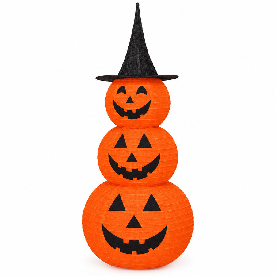 Orange three-tier pumpkin stack with witch hat on white