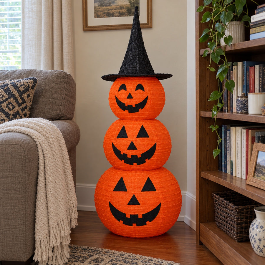 Pumpkin decoration in living room corner by sofa