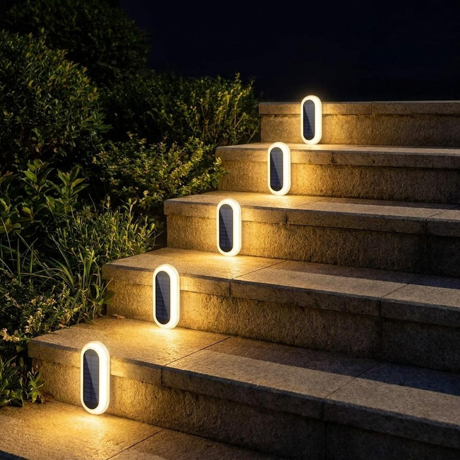 Solar LED stair lights illuminating outdoor stone steps at night