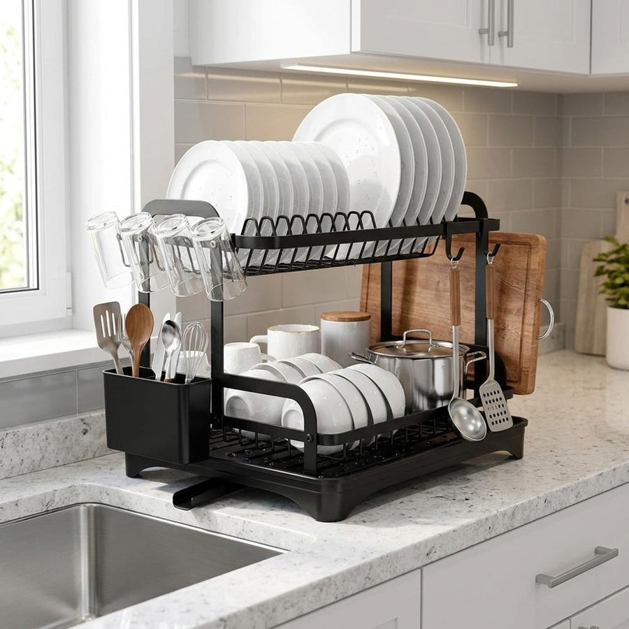 Dish rack fully loaded with plates, bowls and utensils in a modern kitchen