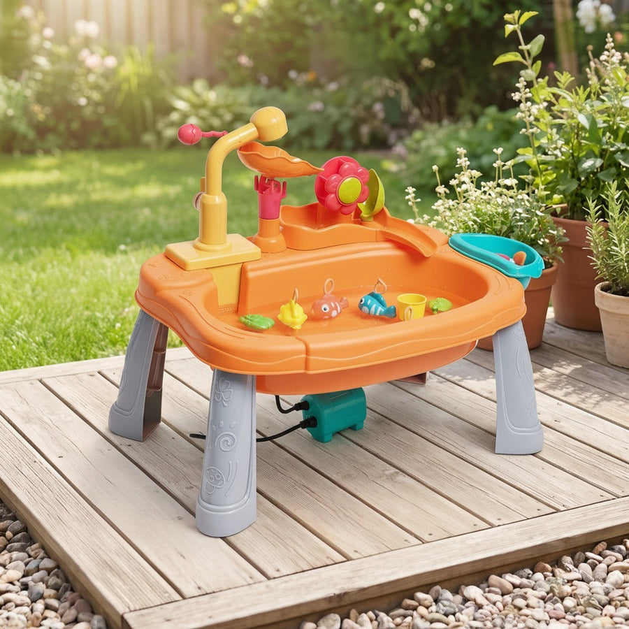Orange kids' water play kitchen shown in a garden setting