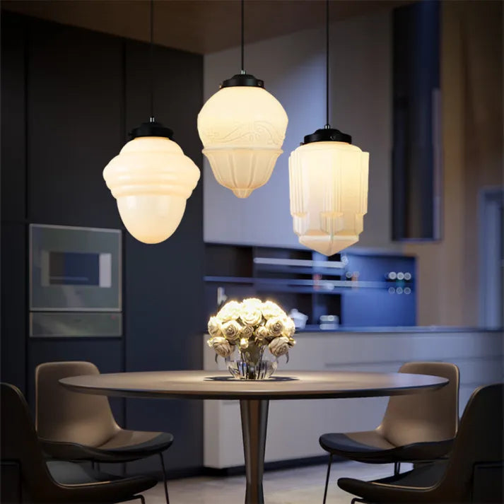 Pendant light with light on, showing warm glow