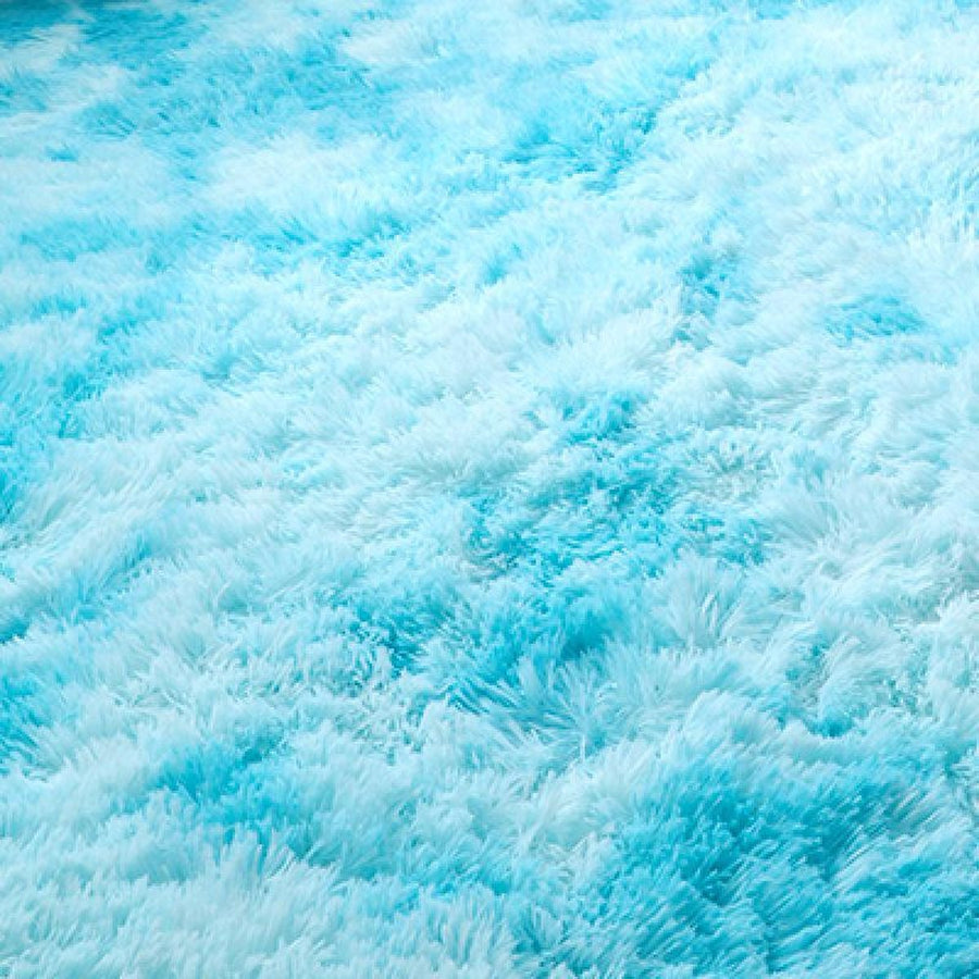 Close-up of soft sky blue long-pile rug fibers