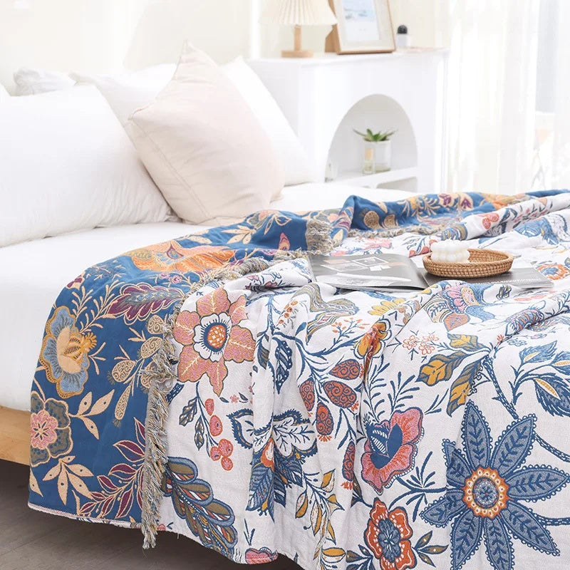Rustic boho patterned throw blanket draped over a couch