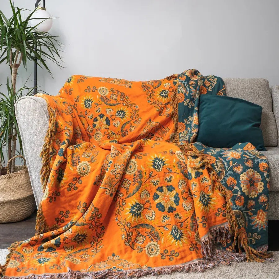 Marigold reversible throw blanket styled in a living room